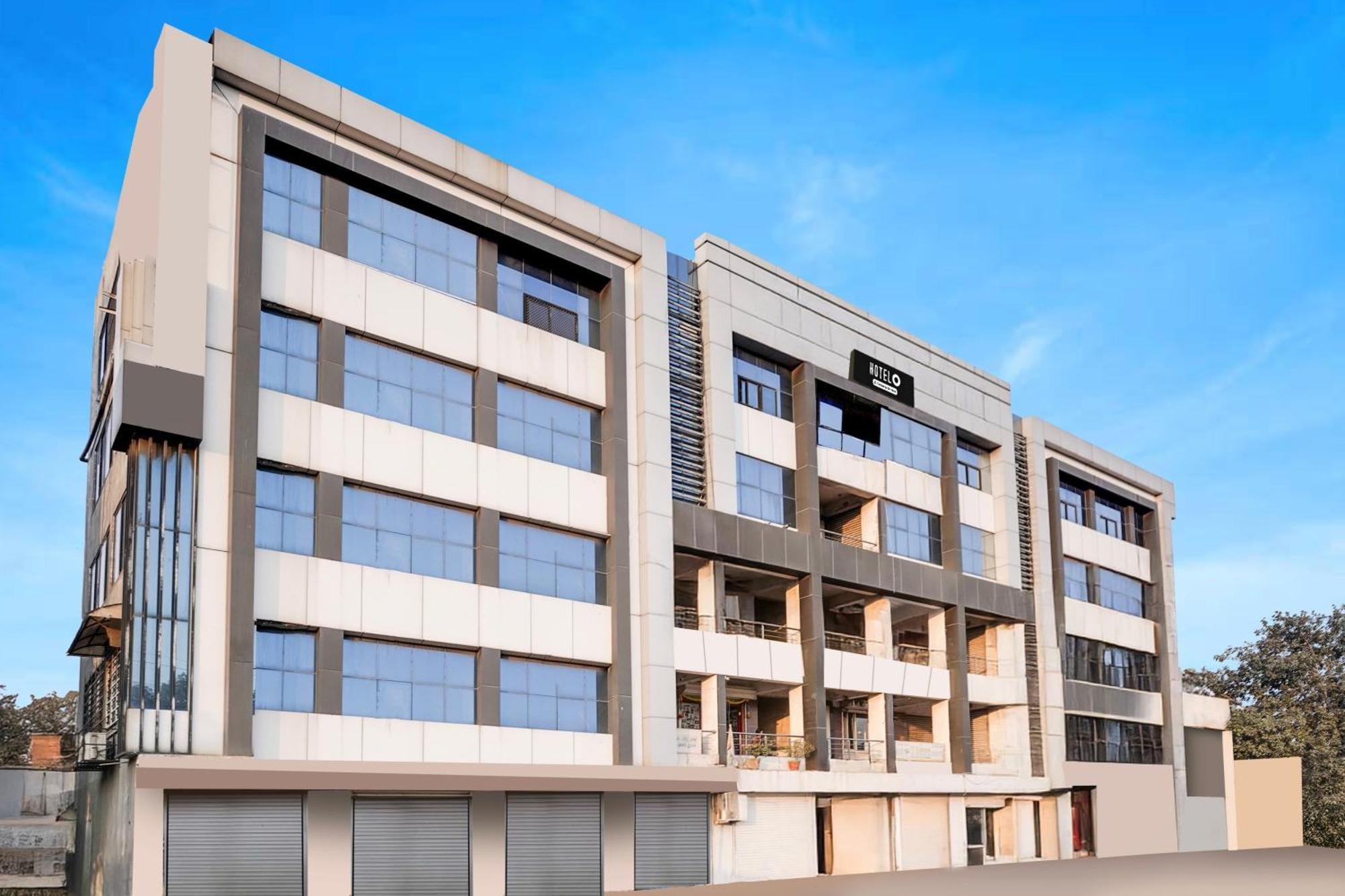 Hotel O Vanya Palace Ahmedabad Bagian luar foto